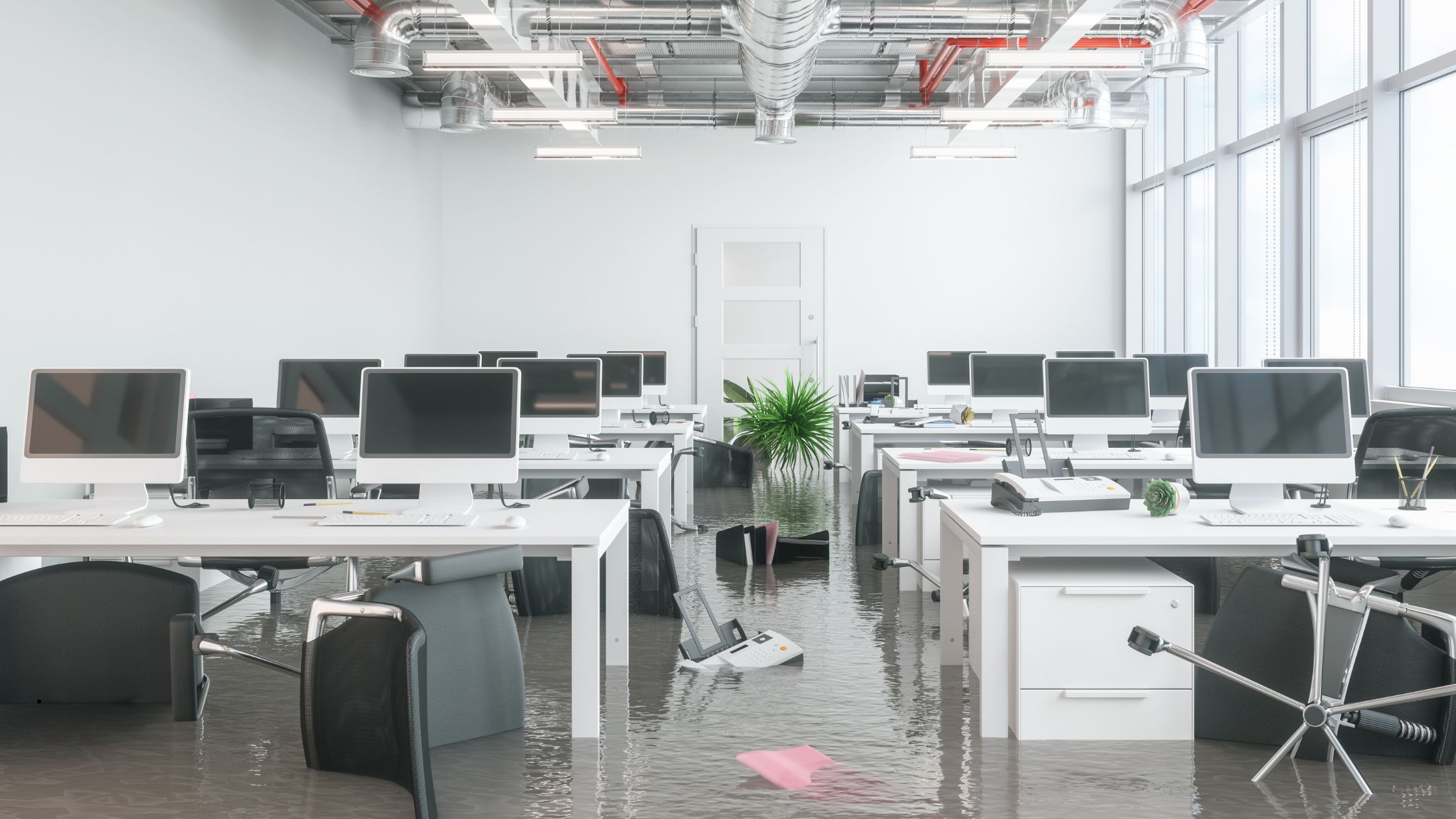 Hurricane rights for tampa bay employers - an office with flood water during a hurricane.